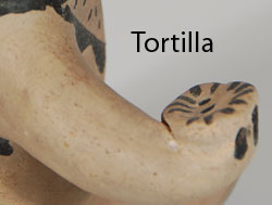 Damacia Cordero was a legend from Cochiti Pueblo. Her storyteller figurines and animal creations were unlike any other potters’ work. She was one of the most prolific figurine potters of the 20th century, yet her pieces are some of the most sought after. She made figurines with more character and expression than most potters.  Here is one of her wonderful seated male figures. The expression on his face is one of bewilderment? Shock? Pleasure? Happiness? You name it and it probably applies.  In his right hand he holds a tortilla that he is offering to someone or preparing to eat.   Condition: the figurine is now in excellent condition after having a small chip repaired.  Provenance: from a gentleman in Missouri  Recommended Reading: The Pueblo Storyteller: Development of a Figurative Ceramic Tradition by Barbara Babcock, et al. 