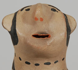Damacia Cordero was a legend from Cochiti Pueblo. Her storyteller figurines and animal creations were unlike any other potters’ work. She was one of the most prolific figurine potters of the 20th century, yet her pieces are some of the most sought after. She made figurines with more character and expression than most potters.  Here is one of her wonderful seated male figures. The expression on his face is one of bewilderment? Shock? Pleasure? Happiness? You name it and it probably applies.  In his right hand he holds a tortilla that he is offering to someone or preparing to eat.   Condition: the figurine is now in excellent condition after having a small chip repaired.  Provenance: from a gentleman in Missouri  Recommended Reading: The Pueblo Storyteller: Development of a Figurative Ceramic Tradition by Barbara Babcock, et al. 
