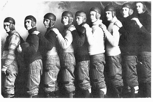 Example football team wearing leather helmets (image from public domain)