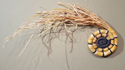 Example image of how a Hopi coiled basket is made from grasses and yucca.