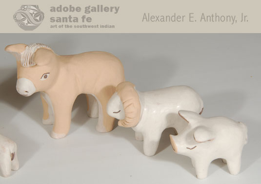 The animals include a donkey with his eyes wide open, a cow with his eyes closed tightly, a mountain sheep with beautiful curve horns, a sheep lying down, a lamb with his head slightly turned, and, unique to nacimientos by Stella Teller, a full-grown pig.  No other potter includes a pig in her sets.