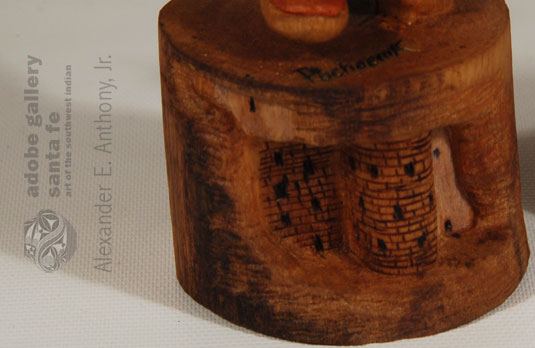Cliff Dwellings carved in the base of this Katsina Doll.