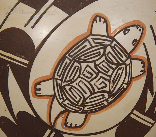 This charming jar featuring two turtle, presumably in motion, was made by Ann Setalla, a member of the Bear Clan and a member of the Feather Woman extended family.  It most likely dates to the 1970s-1980s periods and is in very good condition.  There are no chips or breaks, only a scratch or two.  Provenance:  from the collection of Katherine H. Rust 