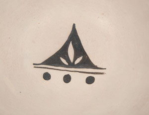 This stew bowl by Cochiti potter Elizabeth Trujillo is boldly decorated on the exterior with connected arrow heads completely encircling the bowl.  On the interior is a traditional Cochiti design for rain.  Trujillo has been actively making pottery since the 1970s.  Her large storage jar entered in competition at Santa Fe Indian Market in 1990 was judged the best pot.  .  The bowl is signed Elizabeth Trujillo Cochiti Pueblo 6/7/81.  Condition:  There is no evidence that the bowl has ever been used.  It is in original condition.  Provenance: from the collection of Katherine H. Rust 
