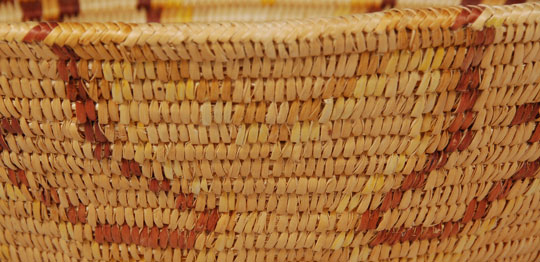 It seems that the Navajo primarily made the wedding or ceremonial baskets in the past, but now they have expanded to making a larger variety of shapes and designs.  The Paiutes of Utah also have made baskets for the Navajo.    Baskets of the shape and style of this one are made for sale, not for use by the Natives.  It does not appear that this one has ever been used as it is in very good condition.  The four peaks in the design could represent the four sacred mountains of the Navajo.  This is, of course, left to the interpretation of everyone except the maker of the basket, as we really do not know what she had in mind.  Condition:  Very good condition  Provenance: from the collection of Kathryn H. Rust  Recommended Reading:  Southwestern Indian Baskets: Their History and Their Makers by Andrew Hunter Whiteford 