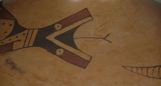 The serpent symbol has been used on old world and new world pottery for hundreds of years.  New Mexico pueblo potters have used the horned serpent—referred to as the Avanyu—for several hundred years.  In Mexico, Casas Grandes potters have done the same.  The Native peoples obviously considered the plumed serpent to be significant.   Scholars have debated its meaning to prehistoric Indians but have not arrived at a definitive answer.  The consensus is that it is a water serpent and is associated with water and fertility.  The serpent on this jar does not feature horns or a head plume but it likely is a representation of the water serpent with the potter taking liberty to make changes.  This is a mid-20th century jar and is signed with the initials E.S.T., a potter we have not yet identified from the Mata Ortiz potters of that time.  These earlier Mata Ortiz pottery vessels were made much closer to the style and coloration of the pre-Columbian pottery of the Casas Grandes of the 1200-1450 periods.  Later developments by Mata Ortiz potters vary considerably from these earlier ones.  Condition:  Very good condition  Provenance: from the Katherine H. Rust collection  Recommended Reading: The Many Faces of Mata Ortiz by Susan Lowell, et al. 