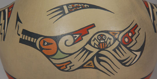 Margaret (b.1936) and Luther (1911-1987) Gutierrez were the children of Lela and Van Gutierrez. Working together, the siblings continued the polychrome style of painting begun by their parents. Sometimes their work is whimsical and other times it is most elegant. This owl effigy figurine is both whimsical and elegant.  The treatment of the eyes expresses the adage of a wise owl through seeing all and missing nothing.  An Avanyu is painted on the front body with a bug peering out from the Avanyu’ s body. Condition:  The owl figurine is in original excellent condition Provenance: from an Albuquerque gentleman Recommended Reading:  Fourteen Families in Pueblo Pottery by Rick Dillingham 