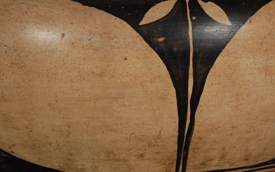 Our first thought when seeing this dough bowl was that it was made by Monica Silva because of the vessel shape and the rim, however, we believe it pre-dates her arrival at what was Santo Domingo Pueblo at the time.  She arrived at the pueblo sometime around 1920 but this bowl appears to date between 1890 and 1900 in our opinion.    The shape of the dough bowl is so graceful in the manner in which it rises from the base to a gentle curve near the rim at which point it curves in slightly and is capped by a half-inch black rim that stands upright.  The coloration of the white slip has turned to a beautiful cream, an indication of significant age.  Another indication often used to date pottery is the red slip that is added over the base just below the design area.  It has been stated that the wider the red band, the older the pottery.  This red band measures about 2-3/4 inches, which is quite significant.  This is one of the most beautiful Kewa dough bowls we have seen in quite some time.  It is bold in design but graceful in shape.  They don&rsquo;t come any better than this.  Condition:  The bowl is in really great condition.  Recommended Reading:  A River Apart: The Pottery of Cochiti & Santo Domingo Pueblos by Valerie Verzuh, et al.  Provenance: from a Santa Fe resident who had purchased it from another Santa Fe resident. 