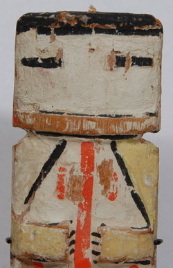 Hanomana is a katsina of the Hopi-Tewa village and is given to their young girls in the same manner that katsinas present Hahai-i-Wuhti to the girls of the Hopi villages. Even some Hopi present her as gifts to Hopi girls.  These flat dolls are the first gifts presented to girls at the dance following their birth. They are called Putskatithu in Hopi and flat dolls in English. They are a popular item for tourists to purchase as gifts for new babies&mdash;sometimes calling them crib katsinas.  Condition: consistent with age  Provenance: from a California gentleman  Recommended Reading: Kachinas: a Hopi Artist&rsquo;s Documentary by Barton Wright 