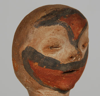 Tesuque Pueblo 19th Century Rain God Figurine Southwest Indian Pottery Figurines Tesuque Pueblo Once scorned as nontraditional curios by collectors and academics, Tesuque rain gods are now thought of as authentic expressions of an indigenous art form. Tesuque rain gods are small ceramic figures. They are not nor have they ever been sacred images. Instead, rain gods were developed at Tesuque Pueblo, north of Santa Fe, to sell as souvenirs to tourists. They were an entrepreneurial response to new economic challenges that resulted from New Mexico becoming an American territory. Thousands of them were made, marketed, and sold, mostly along the route of the Santa Fe Railroad, between 1885 and 1925. In 1904 rain gods sold for 15¢ or 25¢ each. By the 1980s, they were selling for about $30. Now, most of them that date to the late 1800s are over $1000 in price. In 2005, Adobe Gallery exhibited a collection of 105 Tesuque Rain God figurines from the collection of Dana Lipsig. The rain gods in her collection dated from the 1880s to the early 1900s; most were made between 1905 and 1910. During the three-month exhibit, the entire collection was sold. Lipsig said she fell in love with rain gods without really knowing what they were. She found them at galleries, antique shops, and flea markets. This figurine is one of the 105 in the exhibit at Adobe Gallery in 2005. It is now available again. The painting on this figurine is among the most elaborate and exquisite of all the figurines in the exhibit. An accomplished potter sculpted the figurine and an accomplished painter applied the painting. Overall, it makes an impressive statement. There is a metal stand accompanying the figurine. Condition: original excellent condition Provenance: from a gentleman in California who purchased it at the Adobe Gallery 2005 exhibit Recommended Reading: When Rain Gods Reigned: From Curios to Art at Tesuque Pueblo by Duane Anderson. 2002. Museum of New Mexico Press