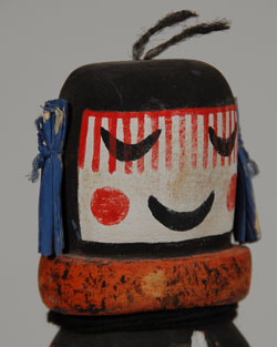 Hahai-i Wuhti is considered the Katsina Grandmother, who, like Crow Mother, is the mother of all Kachinas. Her children are the monsters Nataskas. This Hopi Hahai-i Wuhti Katsina doll was carved from a single piece of cottonwood root, with the addition of the ears which appear to be rolled pieces of corn husk painted to resemble blue corn *piki.  Hahai-i Wuhti is portrayed as a sprightly grandmother.   It is her representation in doll form that is given to the very young Hopi babies and captive eagles.  Condition:  very good condition  Provenance: from a collector of Hopi Katsina dolls from California  Recommended Reading:  Kachinas: A Hopi Artist’s Documentary by Barton Wright  *Note: according to Wikipedia:  Piki (or piki bread) is rolled bread made by the Hopi with nixtamalized corn meal. Blue corn and culinary ash give it a dark grayish-blue color. The light, thin sheets are dry to the point of brittleness and have a delicate corn flavor. It is considered the Hopi version of the tortilla.  Nixtamalization typically refers to a process for the preparation of maize (corn), or other grain, in which the grain is soaked and cooked in an alkaline solution, usually limewater, and hulled. The term can also refer to the removal via an alkali process of the pericarp from other grains such as sorghum. Maize subjected to the nixtamalization process has several benefits over unprocessed grain for food preparation: it is more easily ground; its nutritional value is increased; flavor and aroma are improved; and mycotoxins (a toxic secondary metabolite produced by organisms of the fungus kingdom, commonly known as molds) are reduced. These benefits make nixtamalization a crucial preliminary step for further processing of maize into food products, and the process is employed using both traditional and industrial methods, in the production of tortillas, tamales, corn chips, hominy and many other items. 