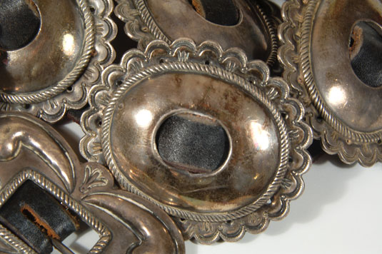 Close up view of the concho - concha detailed design stampwork.