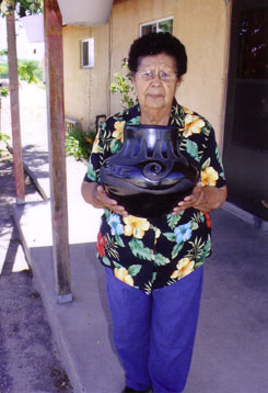 Mida Tafoya holding her mothers jar Christina Naranjo | Santa Clara Pueblo | Southwest Indian Pottery | Contemporary  