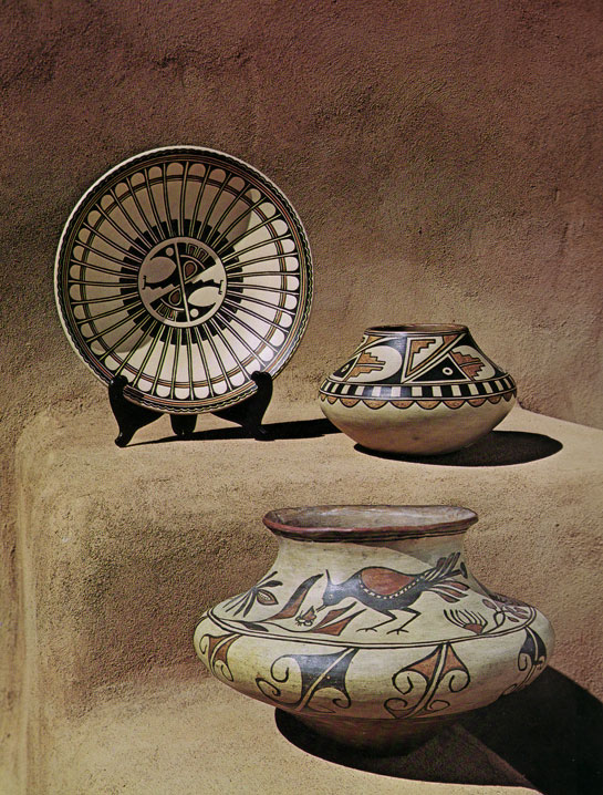 Maria and Julian&rsquo;s earliest work was executed in traditional San Ildefonso Polychrome, the prevailing typology of the time.  Edgar L. Hewitt of the newly founded School of American Research in 1907 began excavating prehistoric sites on the Pajarito Plateau, which is now Bandelier National Monument.  Hewitt, impressed with the quality of Maria&rsquo;s pottery, encouraged her to make pottery using the prehistoric designs being excavated as inspiration.  Maria and Julian did this in Polychrome.  It is often stated that he encouraged them to paint in blackware, but actually they reproduced the prehistoric wares in Polychrome, the prevalent type at the pueblo at the time.  It was years later that they began working in black-on-black.  This exquisite jar features that absolutely stunning 19th century Tewa vessel shape with a large mid-body ring or bulge that provided for a secure hand-hold when the jar was being carried on the head of a person when walking. This shape, slightly modified over time, had existed for 500 years.  The recent modification consisted of shortening the neck of the vessel from the earlier versions that had long graceful necks and lower centers of gravity.  The use of birds in designs existed in late 19th century pottery, but became more prominent in early 20th century vessels.  The use of red slip on the rim gave way to a black rim in late 1800s and substitution of the traditional San Ildefonso white slip to the Cochiti bentonite slip occurred shortly after the turn of the century.  Putting all these facts together, one can surmise that his jar was made around circa 1910.    When we posted this exquisite San Ildefonso olla to our website, we made an attribution to Tonita Pe&ntilde;a (Ba Tse) based on the imagery.  Since that time, we have found that the jar actually is pictured in the book &ldquo;Pottery Treasures: The Splendor of Southwest Indian Art&rdquo; published in 1976.  The caption to the photograph reads: &ldquo;Large jar in foreground was made around 1910 and signed at a later date, &lsquo;Maria Poveka/Julian.&rsquo;&rdquo;  Upon close examination, there is an indication of a previous signature but it has been rubbed off to the extent that it is not readable, however, there is no question that this jar is the same one pictured on page 36 of the book.  So, based on this documentation, we must say that this jar was made by Maria and painted by Julian as attested to by Maria signing the jar at a date later than when it was made.  Referenced Information:  Pottery Treasures: The Splendor of Southwest Indian Art with photography by Jerry Jacka and text by Spencer Gill.  ISBN 0-912856-28-9. Graphics Arts Center Publishing Company, Portland, 1976.   Provenance: Marjorie and Charles Benton collection, Evanston, IL 