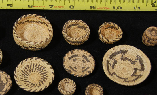 This collection of miniature baskets was assembled in the 1960s by a client from the Midwest.  The collection represents weavers from Tohono O'odham, Akimel O'odham and Pomo tribes.  The collection is being offered as a group for the stated price, which, it has been determined, is well below market value.   Condition: original condition Provenance: from the collection of a Midwest collector Recommended Reading: Southwest Indian Baskets: Their History and Their Makers by Andrew Hunter Whiteford