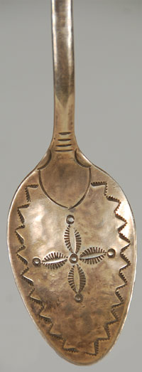 Silver Navajo Spoon with Feather-design Handle close-up view