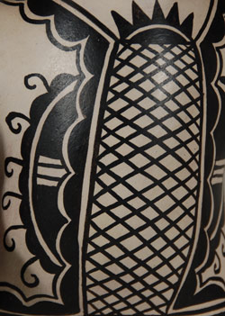 close - up Cochiti Pottery Figurine of a Giant Capturing a Child