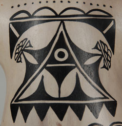 close - up Cochiti Pottery Figurine of a Giant Capturing a Child