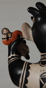 Virgil Ortiz (born 1969) is probably one of the most versatile of all pueblo potters. He makes traditional figurative pottery, experimental figurative pottery, traditional pottery vessels, and, now, designer clothing.    When recently shown this figurine, Virgil said &ldquo;It is from a story/myth about when giants were here.  Used to gather kids for food!&rdquo;  The figurine is typical of creations from the fertile mind of Virgil Ortiz.  There is no other pueblo artist of today who is as creative in figurative pottery as is he.  His figurines are based on legends, myths and ideas from his own mind.  Never are they unimaginable.  The figurine may be of a monster-type giant but he sure is beautifully presented.  He is painted with a variety of designs over his whole body, front and back.  He is magnificent as are all of Ortiz&rsquo;s pottery figurines. It is signed by the artist and dated 1995.  Condition: original condition Provenance: from the collection of an Indiana family Recommended Reading: Clay People: Pueblo Indian Figurative Traditions by Jonathan Batkin 