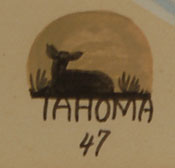 Signature of Quincy Tahoma (1917-1956) Water Edge.  This painting is signed in the lower right Tahoma ‘47. It also features his cartouche of a resting deer. 