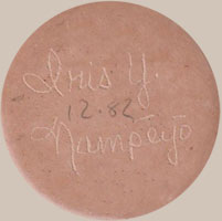The jar is signed Iris Y. Nampeyo into the clay.  The date 12-82 is written in pencil.