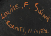 Signature of Louise E. Suina
