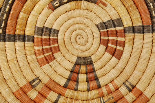 The Hopi from the Second Mesa villages of Shungopavi, Shipaulovi, and Mishongnovi have made coiled basketry for more than a hundred years and those made today are made in the same manner as before.  