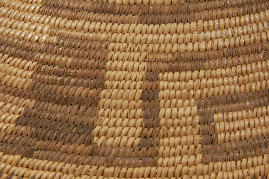 This bowl is of average size with good depth.  It displays the fine stitching accomplished by many Pima basket makers and a design that is amazingly complicated and well executed.  It is a work of art.