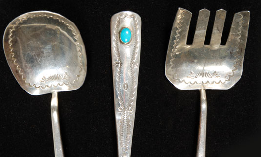 Close up views of this silverware set (Fork and Spoon).