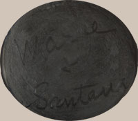 This jar is signed Marie & Santana, the earlier signature, indicating that it was made from mid-1940s to mid-1950s. 