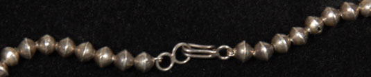 Necklace hook and loop connection.
