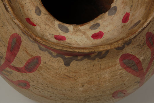 Inside the neck is a support of the type seen with jars that have lids but there are no wear patterns to indicate that this jar ever had a lid.  