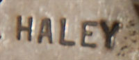 It appears to have been made in the 1960s by a Navajo artisan named HALEY who was a silversmith working for Atkinson Trading Company of Gallup, New Mexico.  Trading posts such as this would provide all the materials to smiths and then pay them for the labor costs.