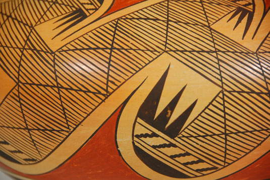 Collectors never tire of Hopi-Tewa pottery with the migration pattern as it is a design that fills the area of the vessel completely and has a dynamic flow of a wave in the ocean.  One can feel the motion as if the breakers were crashing against the beach.  Of course, that is not the inspiration for the design, just a feeling I get when seeing the pattern.