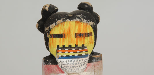 Close up view of the face of this Katsina Doll