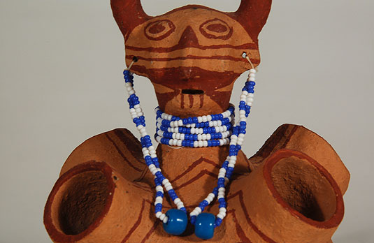 Close up view - Effigy vessels like this were true to form in relation to facial and body tattoos as worn by Mojave women and as portrayed on the Mojave dolls.  