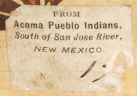 The bowl has a paper label that reads From Acoma Pueblo Indians, South of San Jose River, New Mexico.