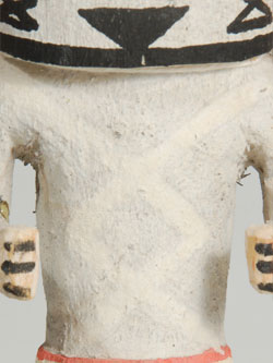 This is a very early carving, probably from the first quarter of the 20th century. The body paint appears to be from a mineral source.  It looks like the first coat of pigment is blue with a white wash over the blue.  