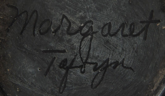 The jar is signed Margaret Tafoya on the underside.  It probably dates to the late 20th century.
