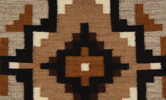 Close up view: Rachel Curley is known for achieving 50 to 100 warp per inch and 15 to 20 weft per inch.