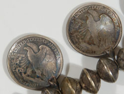 Close up view of coins - back side.