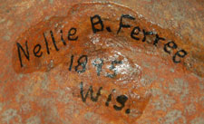 On the bottom of the jar, written in ink, is Nellie B. Ferree 1895 Wis.  It is presumed that this was a previous owner.  Nellie B. Ferree was listed in the Minnesota State Census of 1905 as having been born in 1895 in Illinois and was living, in 1905, in Paynesville, Stearns, Minnesota.