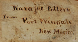 Beautifully written in cursive script on a paper attached to the base is Navajoe Pottery from Fort Wingate New Mexico.