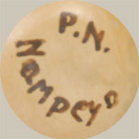 The jar is so small that Priscilla only had room to place her initials P. N. and Nampeyo on the base.