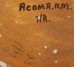 The underside is signed Acoma, N.M. and with the initials HR in fired-on text and $2.50 in pencil.