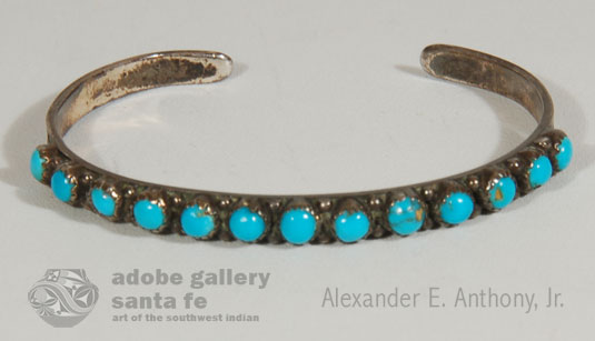 This delicate bracelet features 13 small turquoise stones. Each robin&rsquo;s egg blue stone has been meticulously shaped and set on a sterling silver band. 