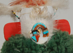Most unusual is a Zuni multi-stone Rainbow Man pendant attached to the back of the mask.  
