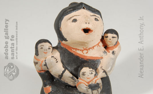Close up view of this storyteller figurine.