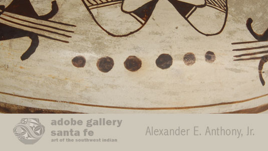 The unusual design is the row of six dots.  Marti Struever stated that it was a “rare design of dots.”