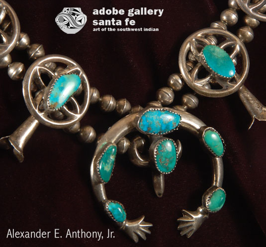 The artist fashioned the ends of the naja into two small outstretched hands. It is believed that the hands, derived from the Moors, represent the “hands of Fatima.” An age-old symbol of protection derived from the Moors, the Diné have used the crescent-shaped motif in jewelry for more than a hundred years, innovating the design in creative new ways to make it uniquely their own. The Diné were exposed to the naja from the bridle worn on the head of the horse of the Spanish.  They adapted it for use on a necklace.